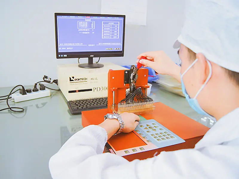 Engineer reviewing a printed circuit and interface drawing package